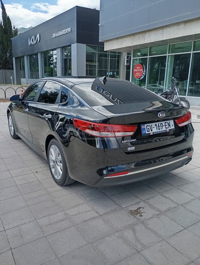 Kia Optima - фото 8