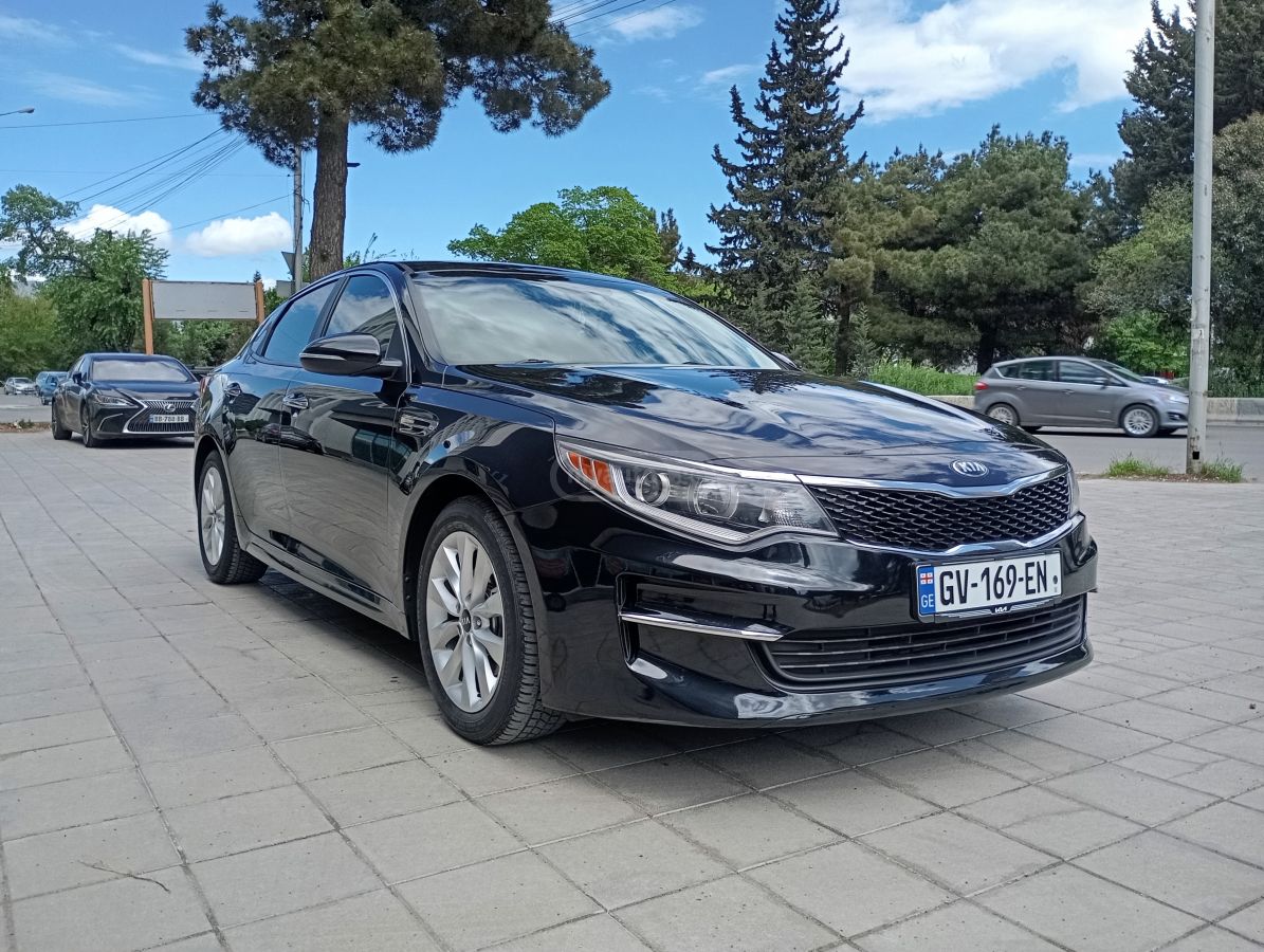 Kia Optima - фото 9