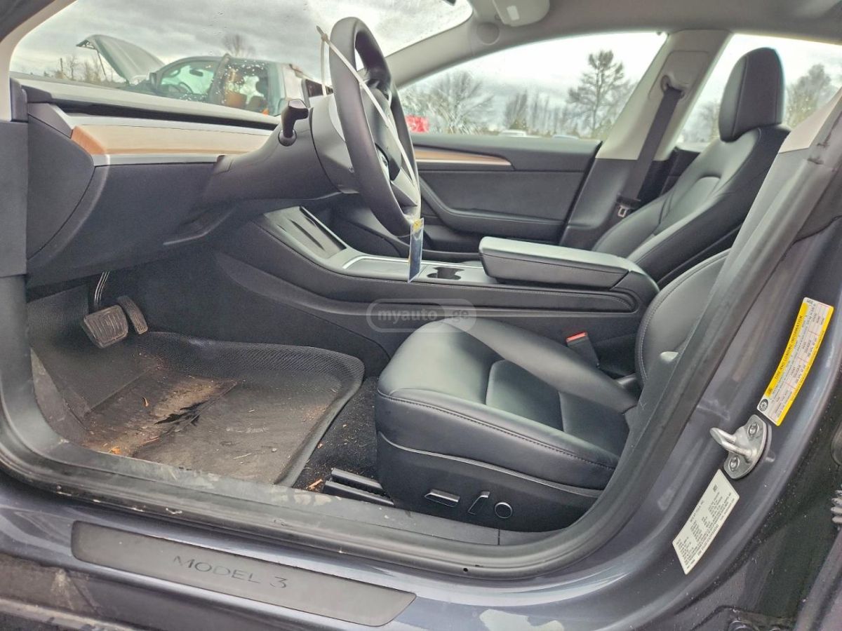 Tesla Model 3 - фото 10