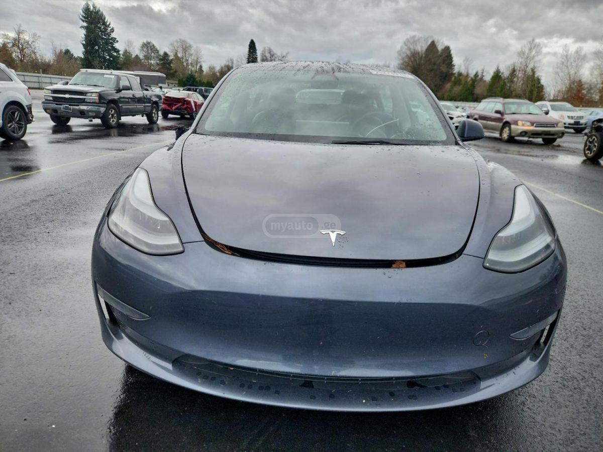 Tesla Model 3 - фото 8