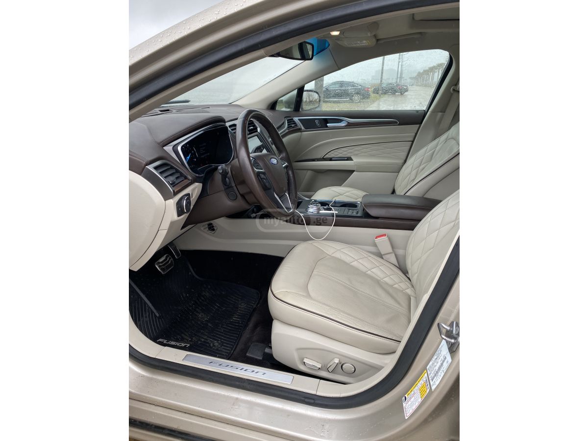 Ford Fusion - фото 11