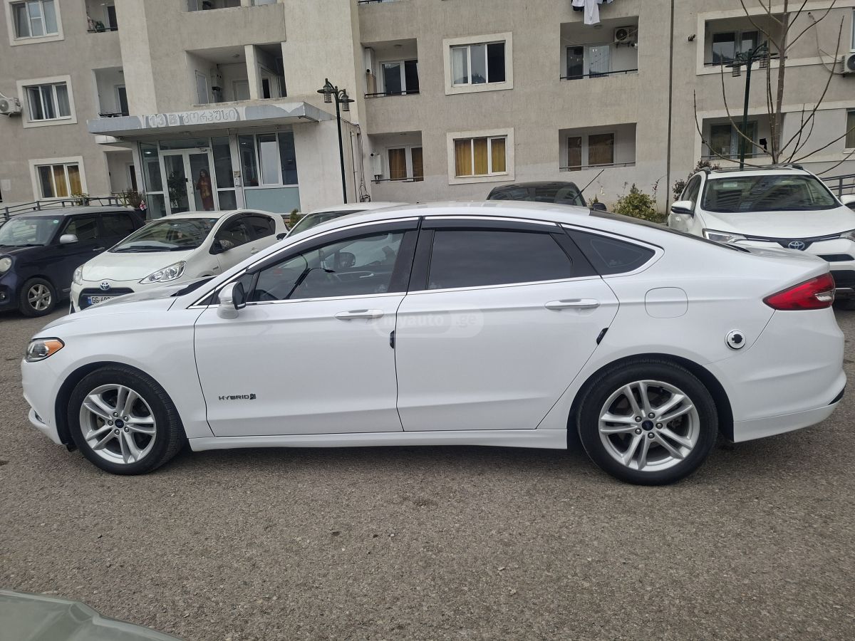 Ford Fusion - фото 13