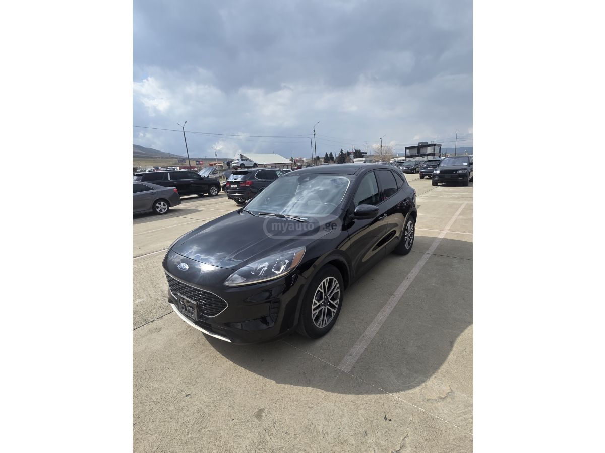 Ford Escape - фото 1