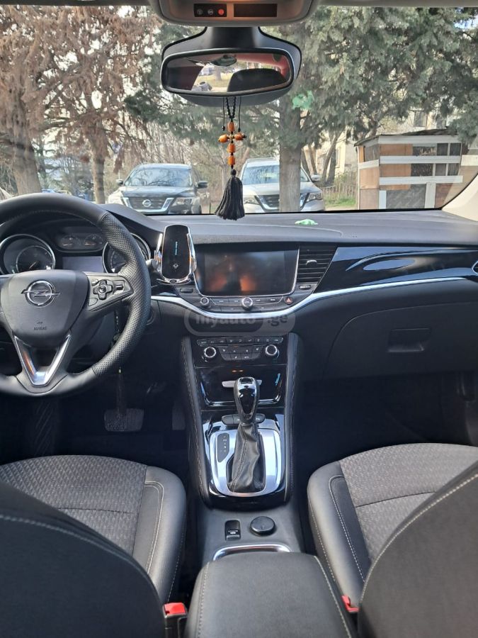 Opel Astra - фото 7