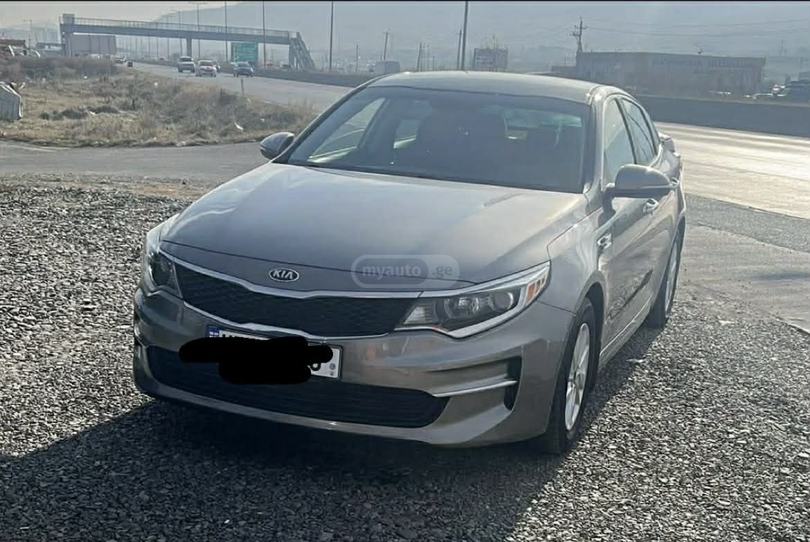 Kia Optima - фото 1