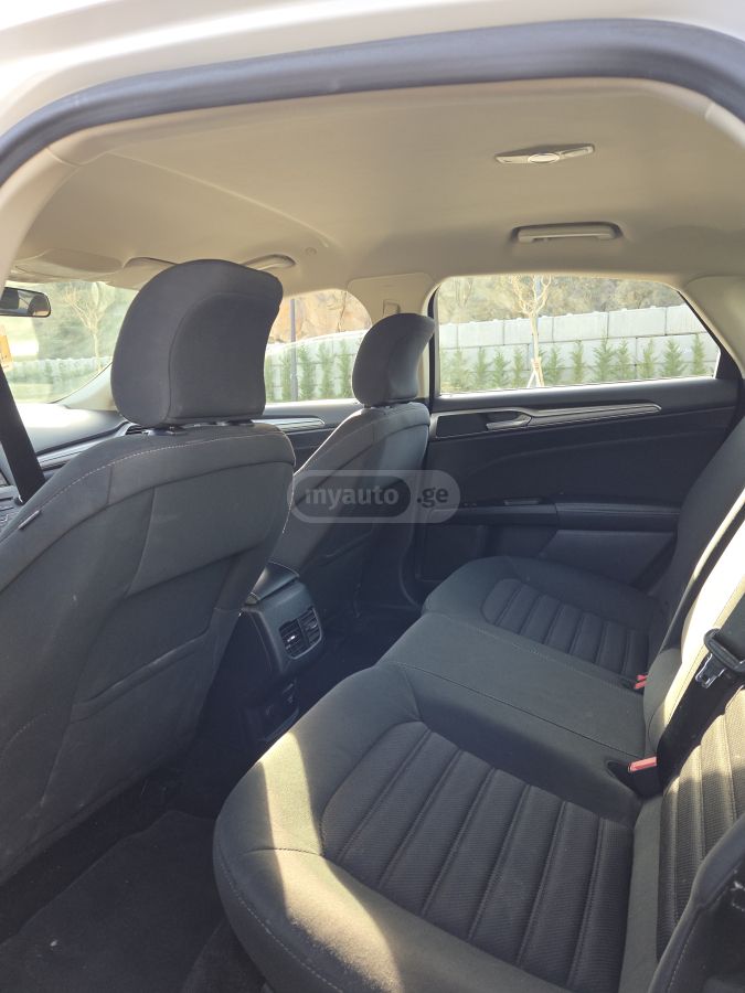 Ford Fusion - фото 7