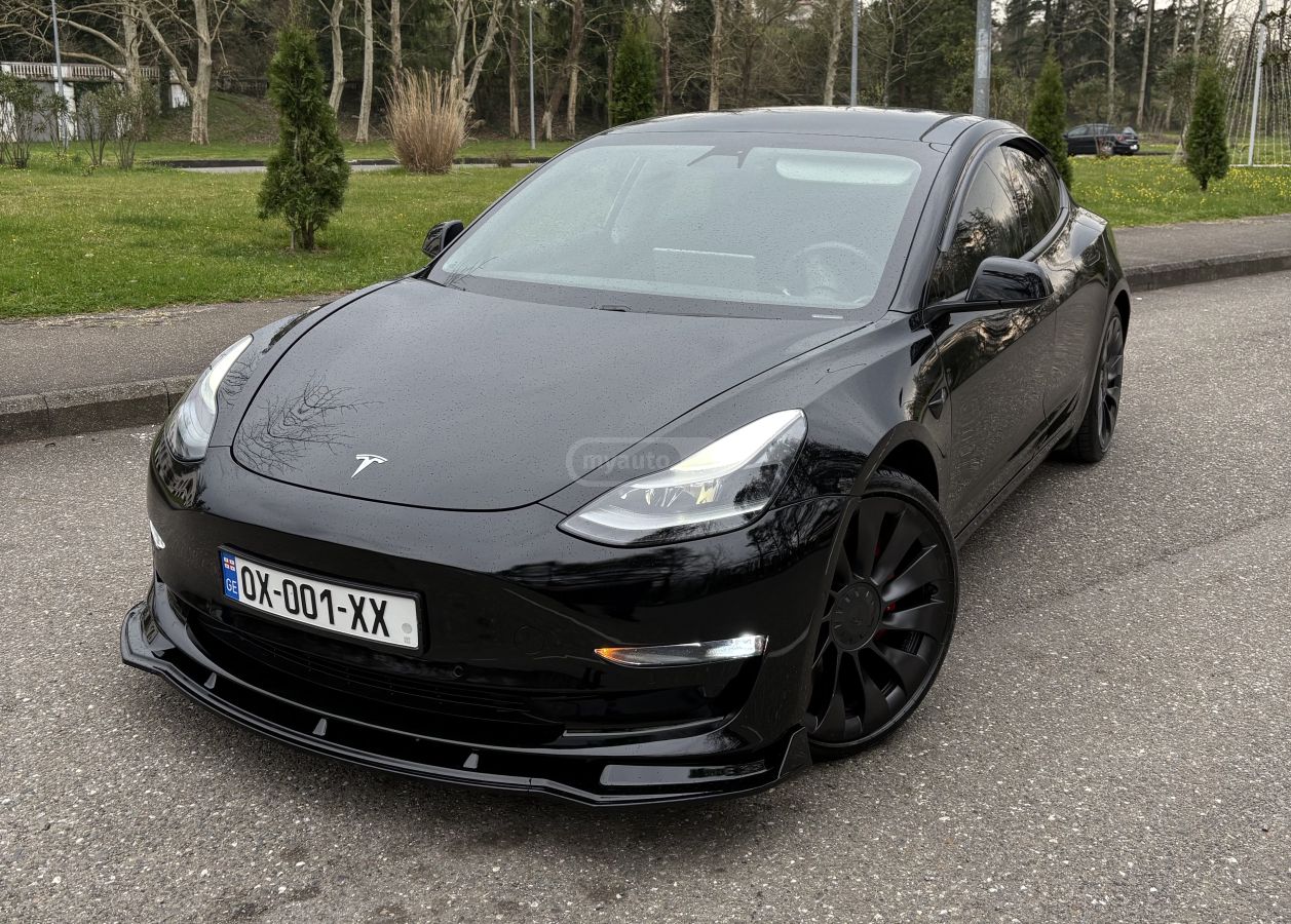 Tesla Model 3 - фото 1