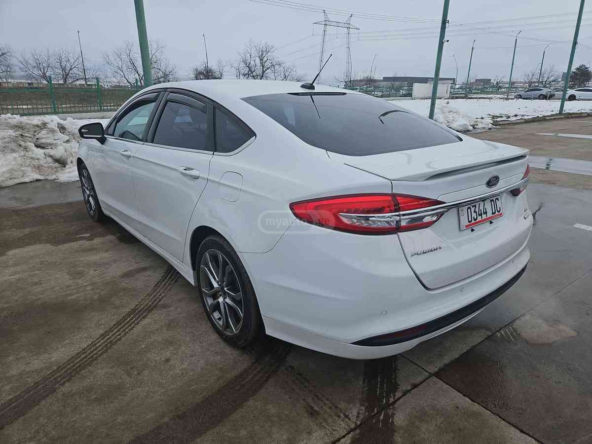 Ford Fusion - фото 8