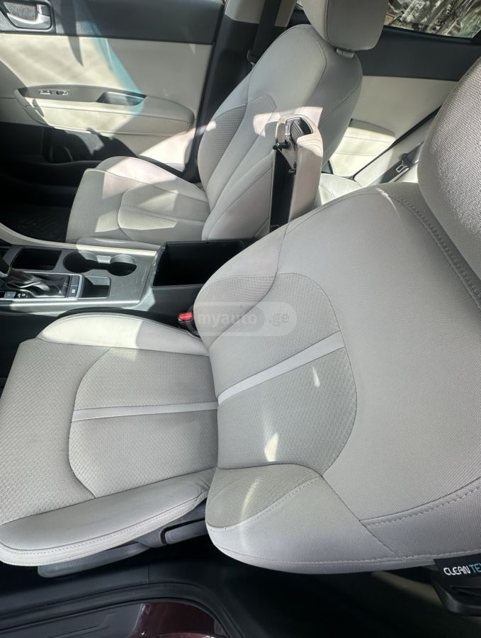 Kia Optima - фото 6