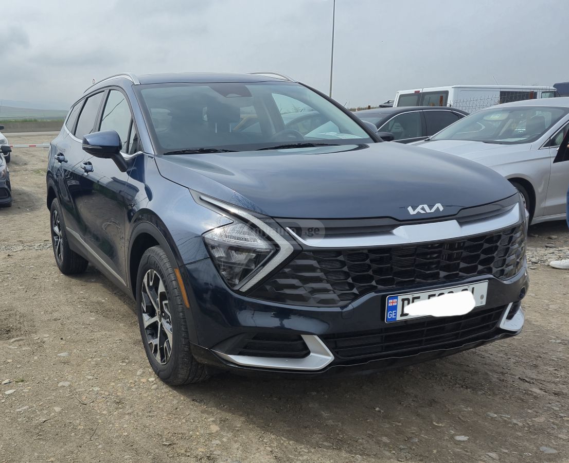 Kia Sportage - фото 1