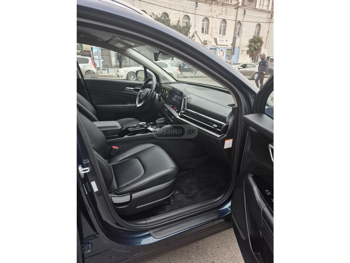 Kia Sportage - фото 11