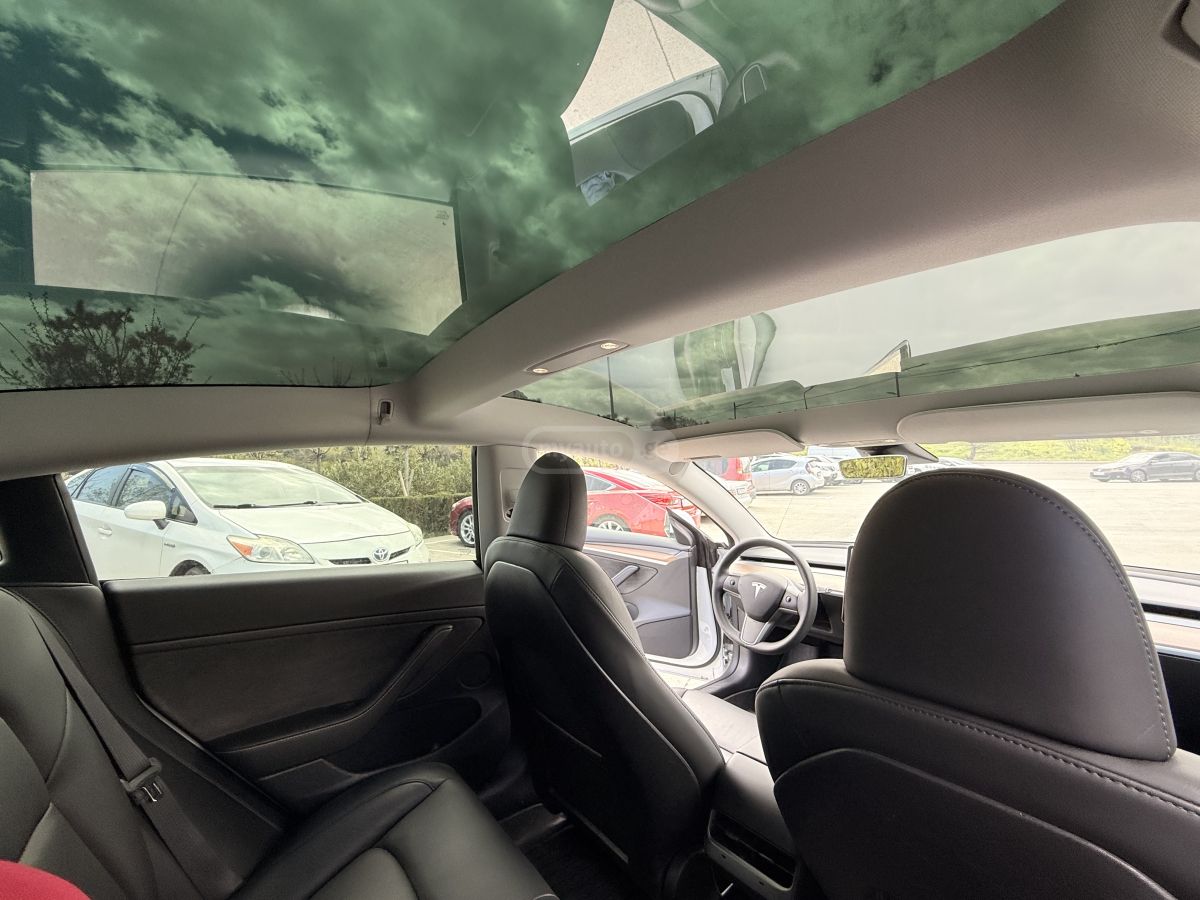 Tesla Model 3 - фото 10