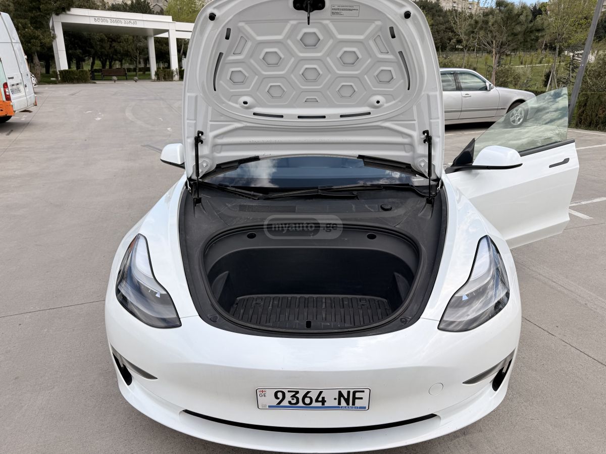 Tesla Model 3 - фото 12