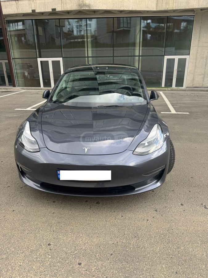 Tesla Model 3 - фото 1