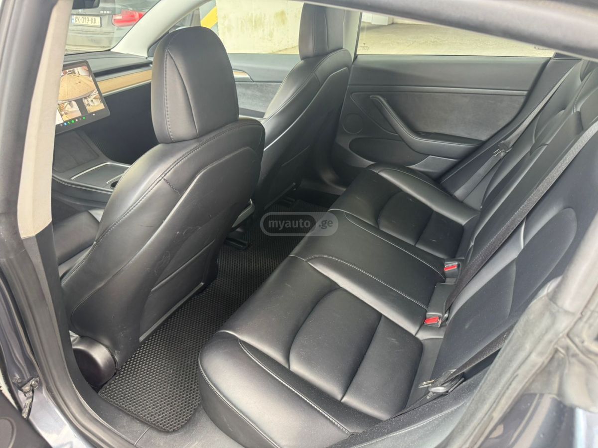 Tesla Model 3 - фото 10