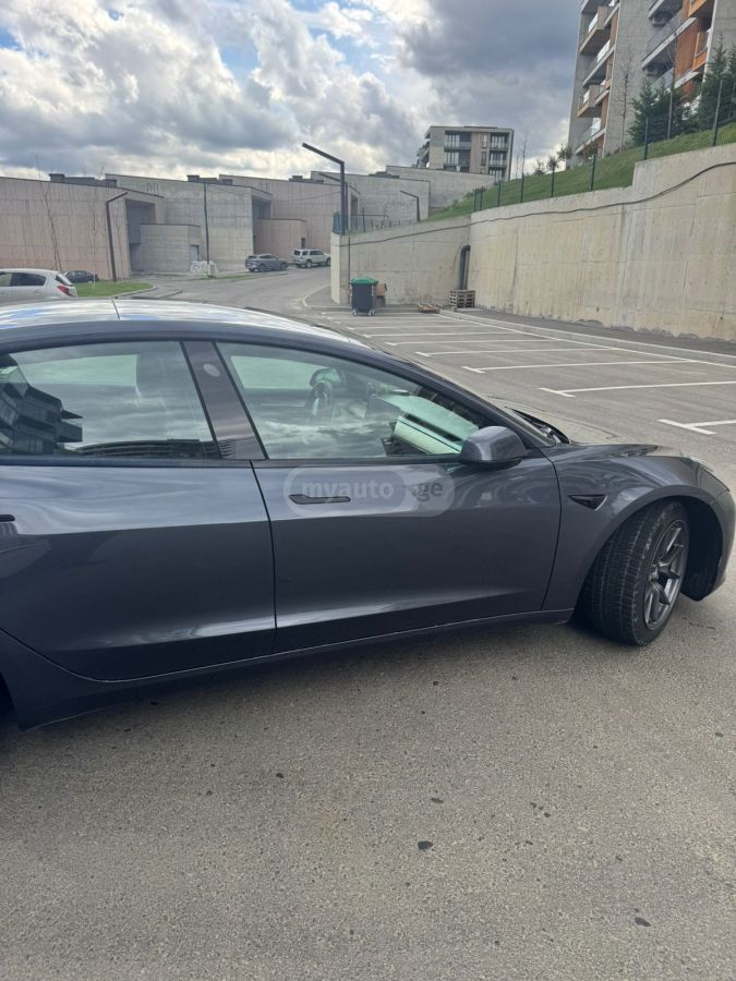 Tesla Model 3 - фото 7