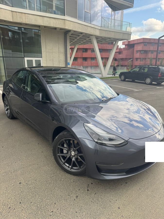 Tesla Model 3 - фото 8
