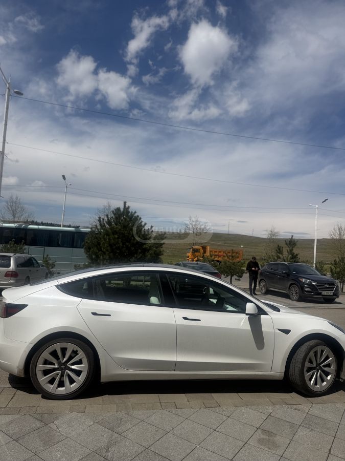 Tesla Model 3 - фото 10