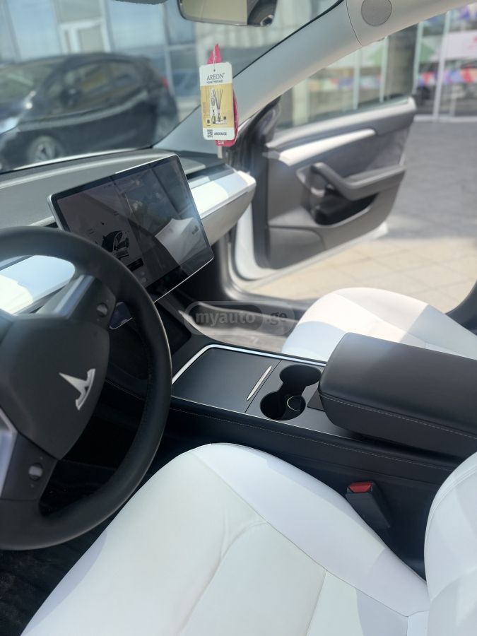 Tesla Model 3 - фото 7