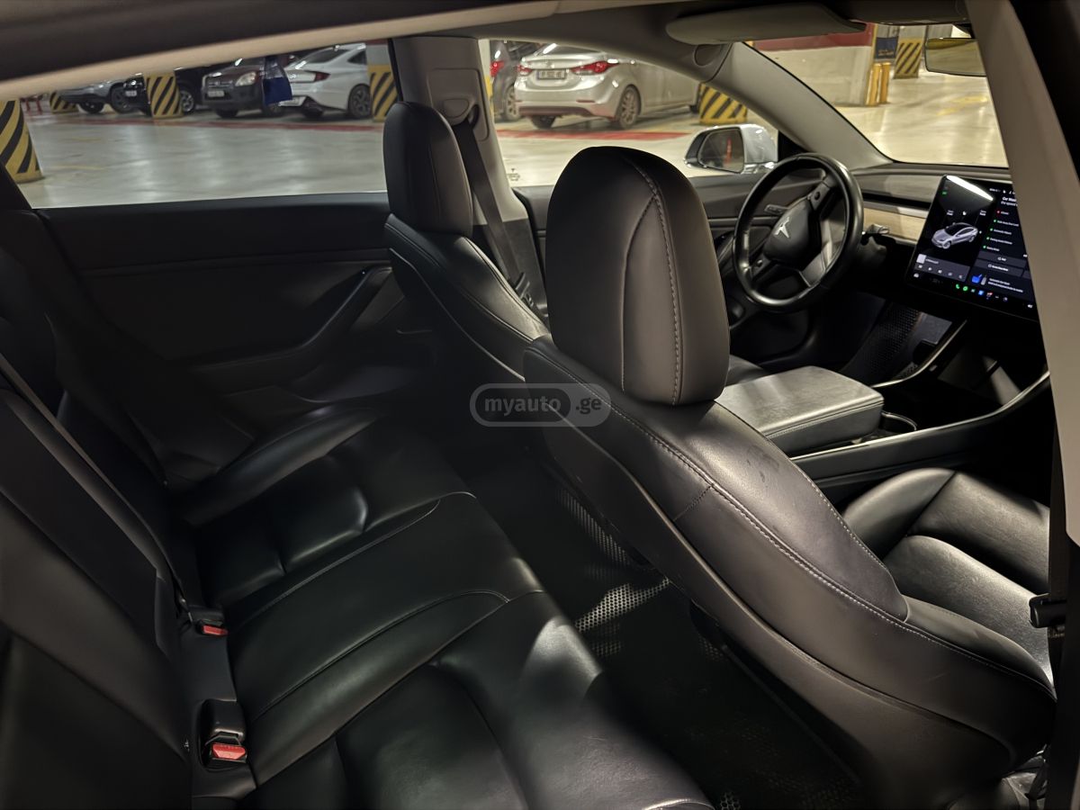 Tesla Model 3 - фото 6