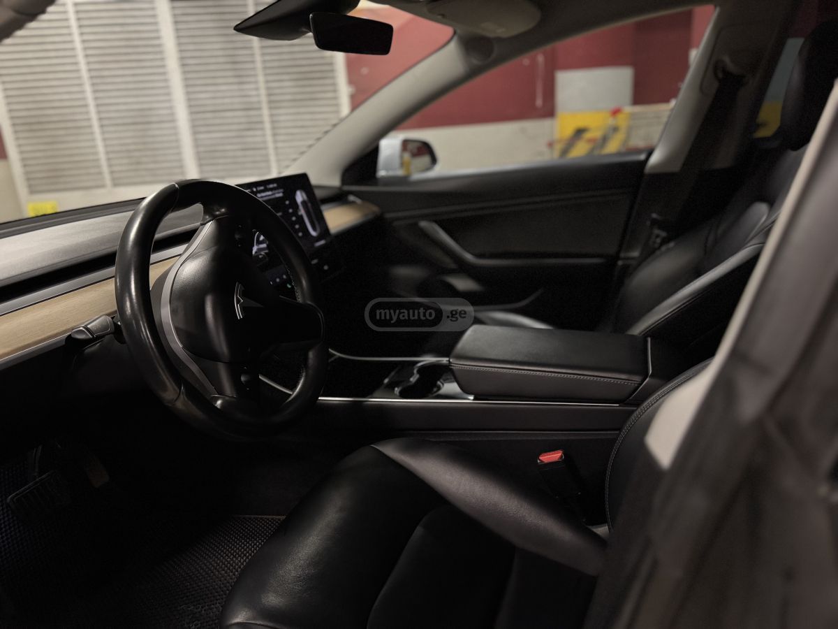 Tesla Model 3 - фото 7