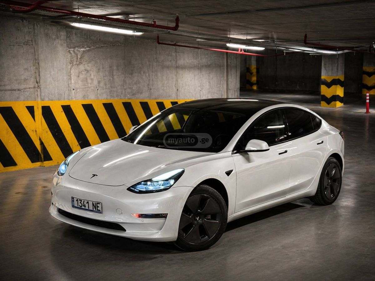 Tesla Model 3 - фото 1