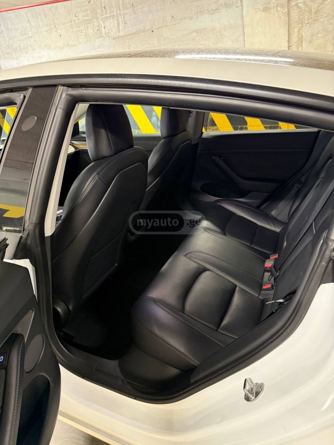Tesla Model 3 - фото 10
