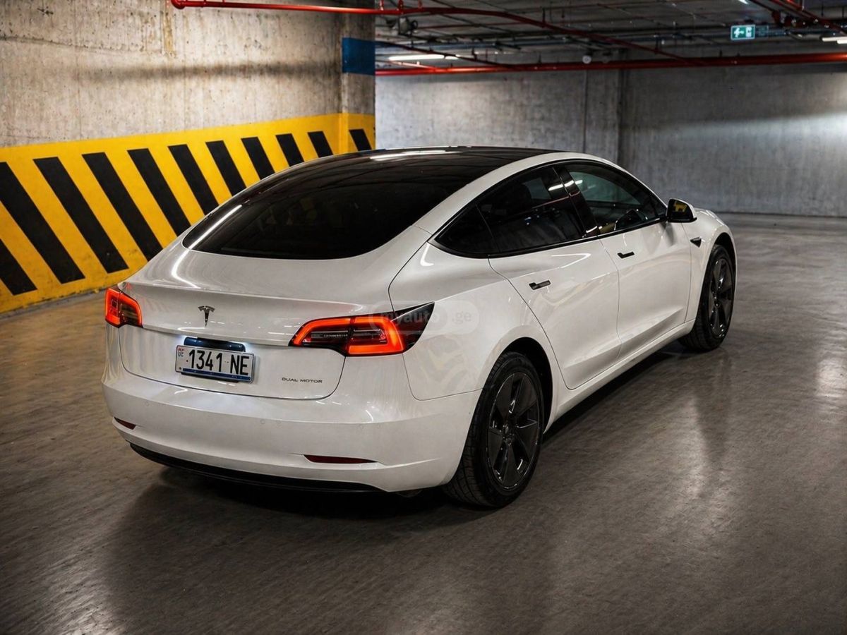 Tesla Model 3 - фото 7