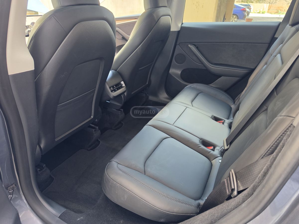 Tesla Model Y - фото 11