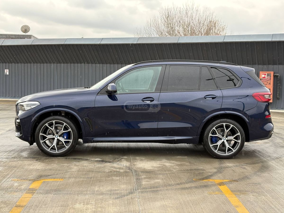 BMW X5 - фото 7