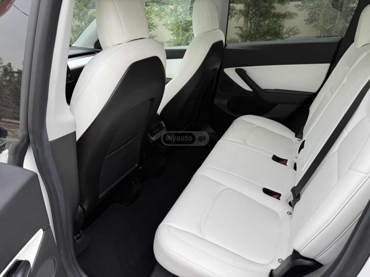 Tesla Model Y - фото 10