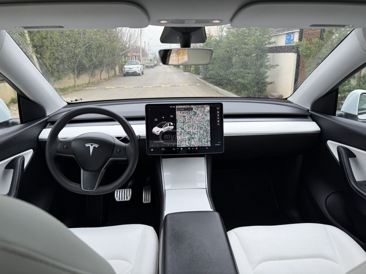 Tesla Model Y - фото 8