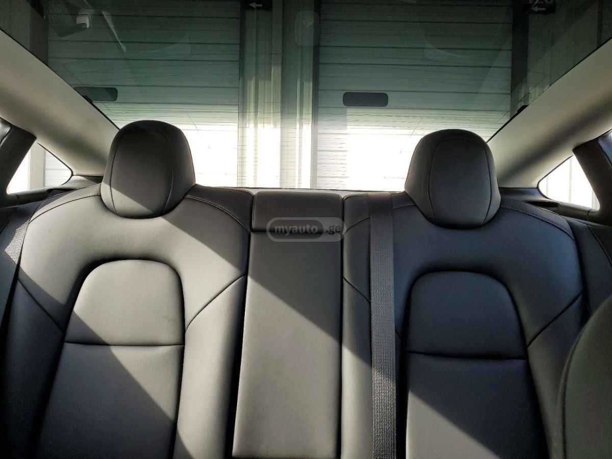 Tesla Model 3 - фото 11