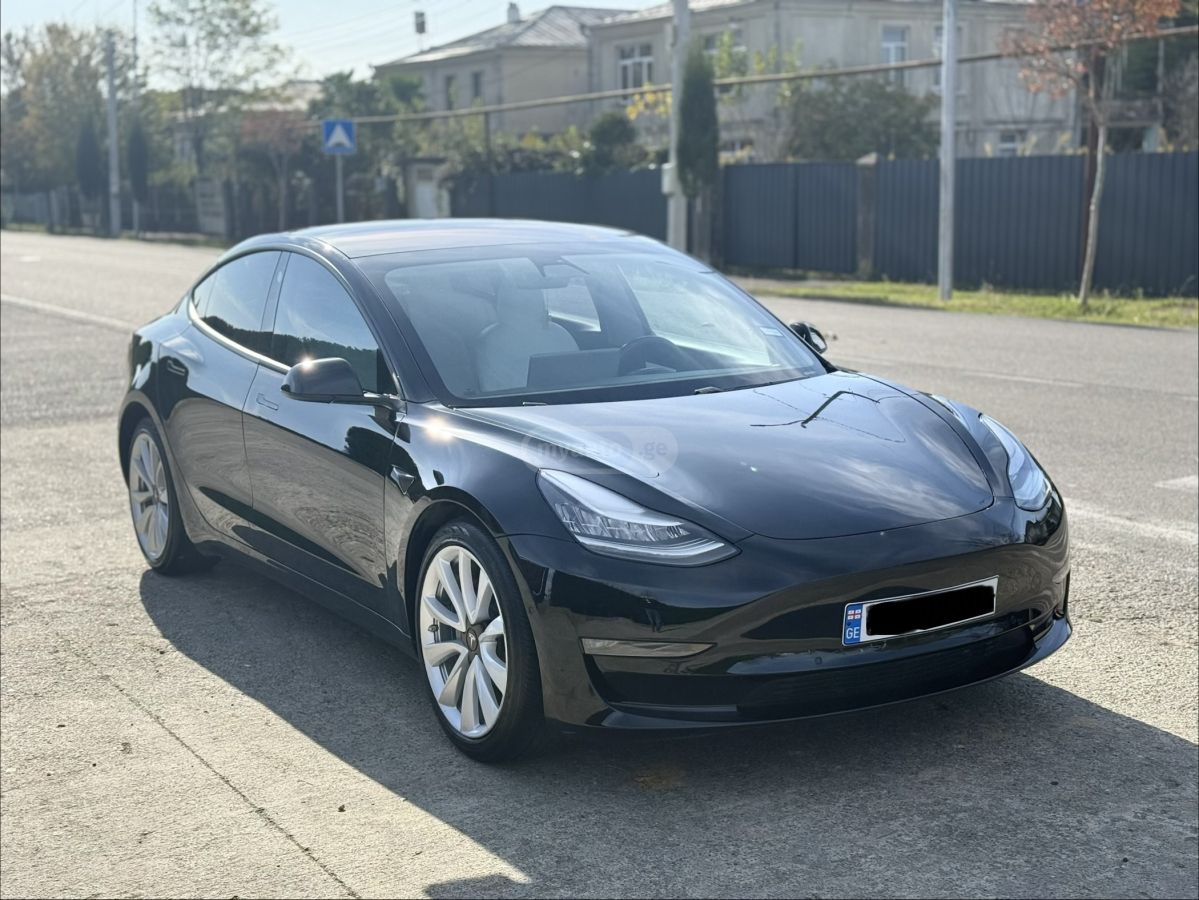 Tesla Model 3 - фото 1