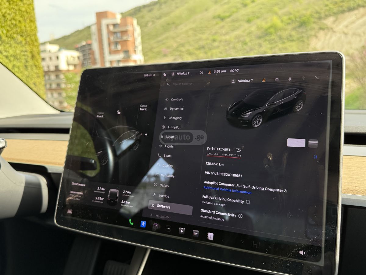 Tesla Model 3 - фото 10