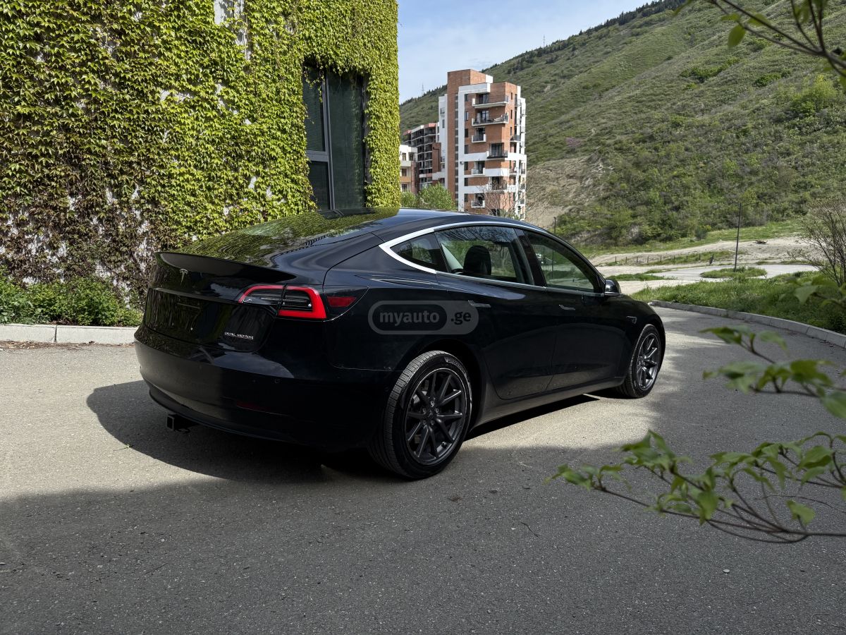Tesla Model 3 - фото 6