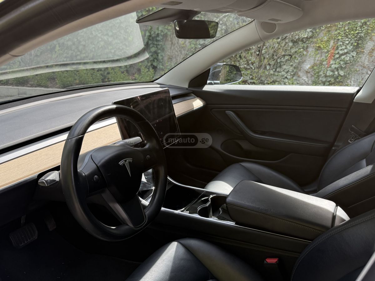Tesla Model 3 - фото 8