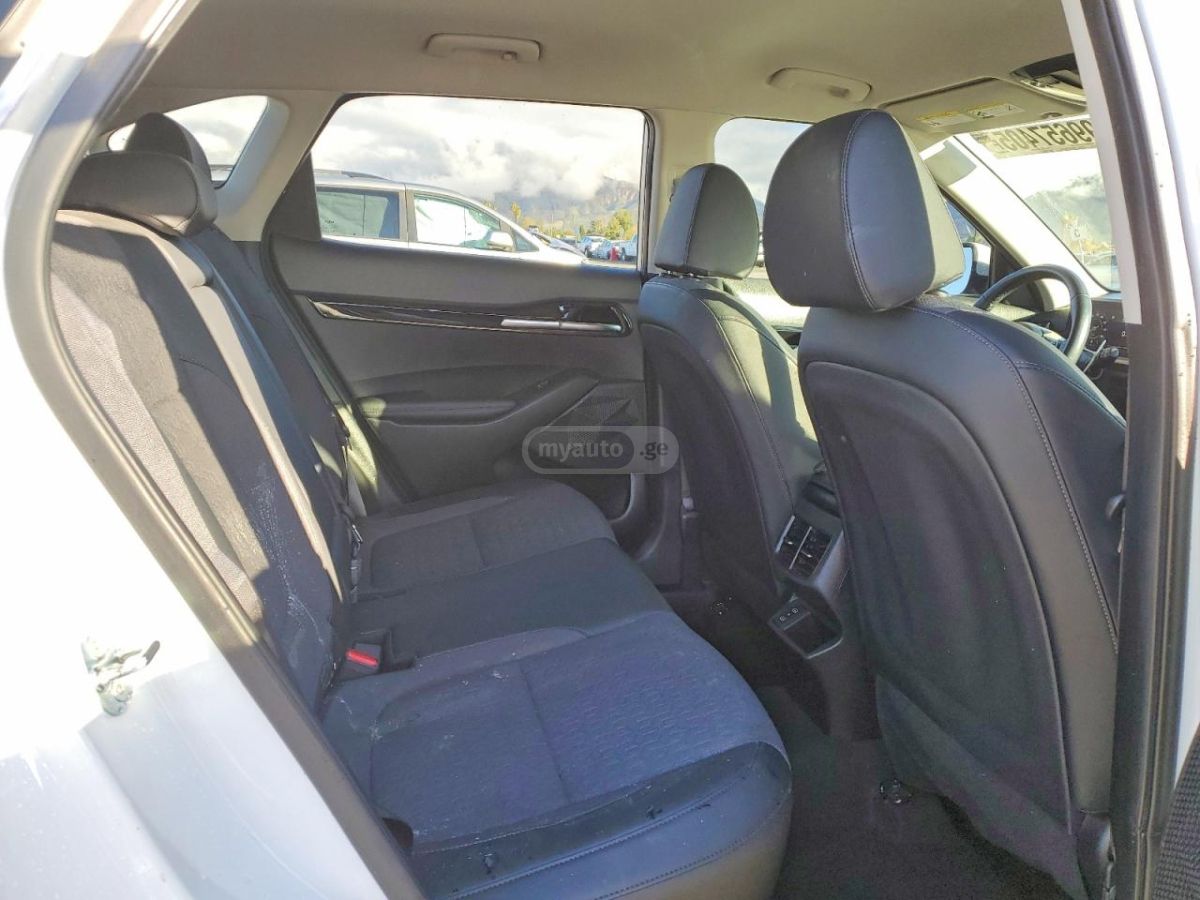 Kia Seltos - фото 10