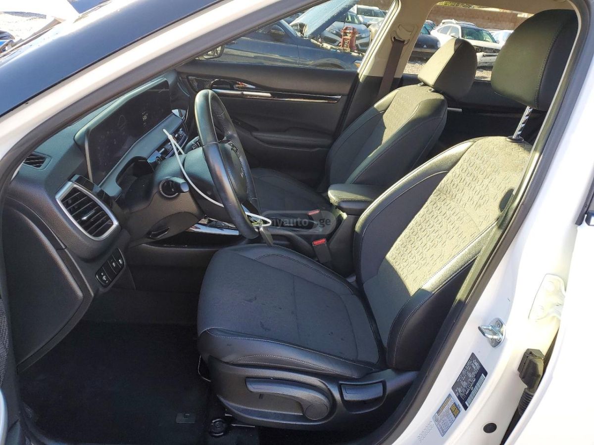 Kia Seltos - фото 7