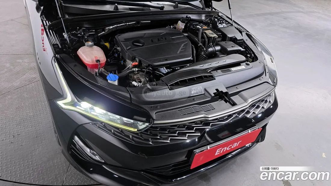 Kia Optima - фото 6