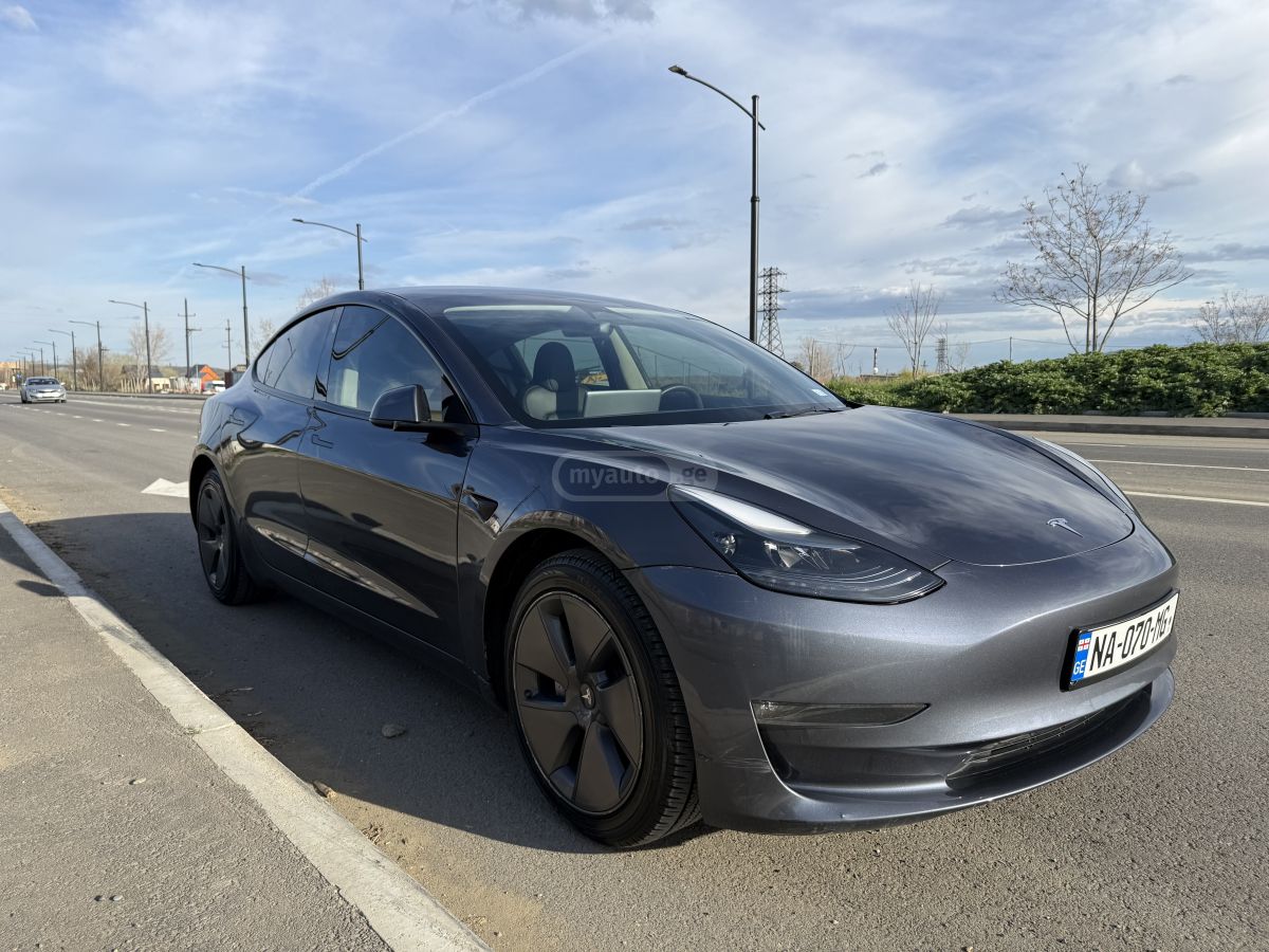 Tesla Model 3 - фото 10