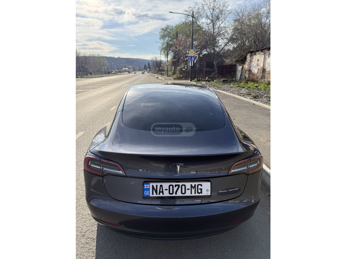Tesla Model 3 - фото 13