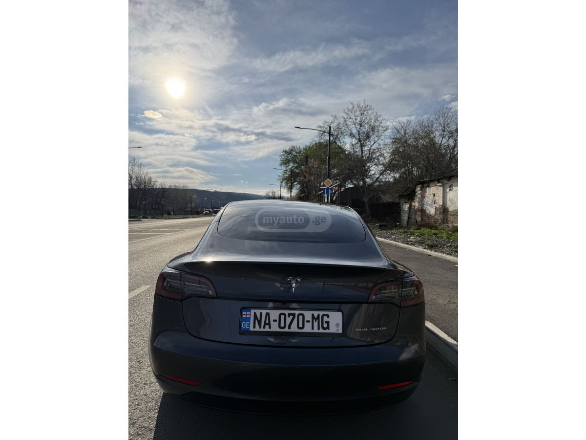 Tesla Model 3 - фото 15