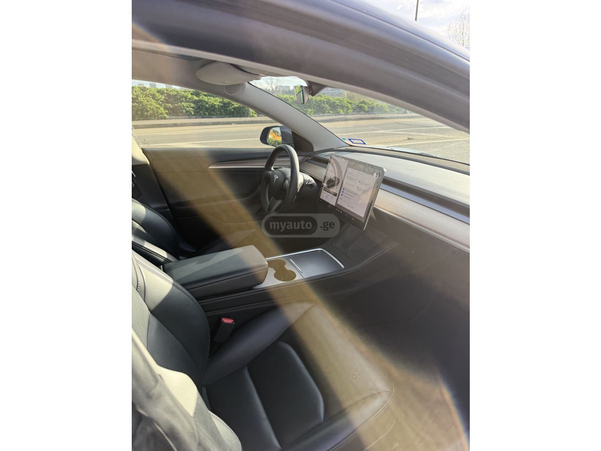 Tesla Model 3 - фото 6