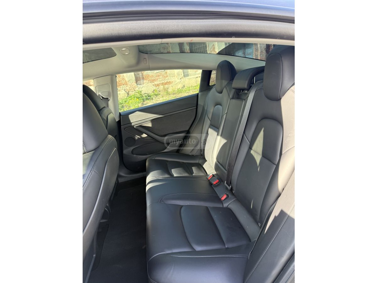 Tesla Model 3 - фото 8