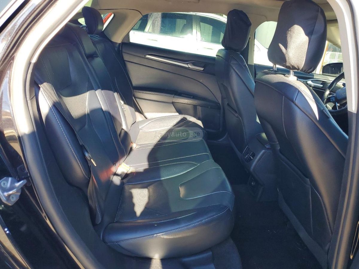 Ford Fusion - фото 9