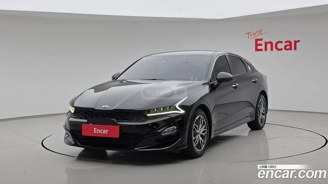 Kia Optima - фото 1