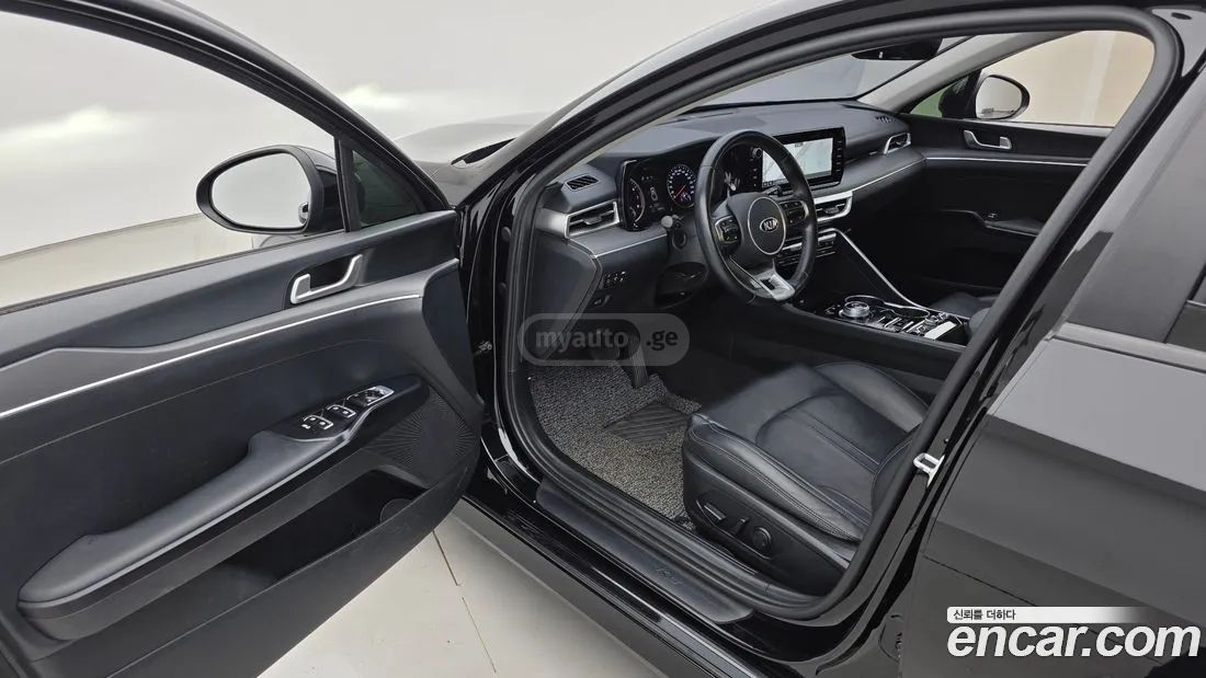 Kia Optima - фото 11