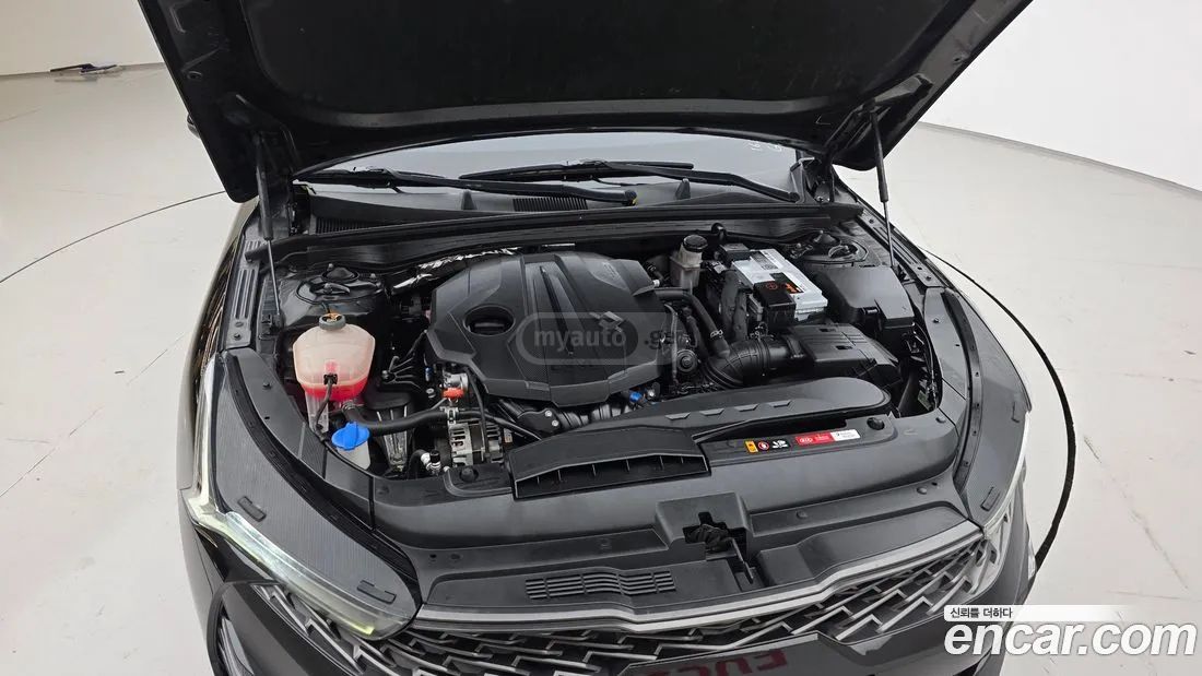 Kia Optima - фото 6