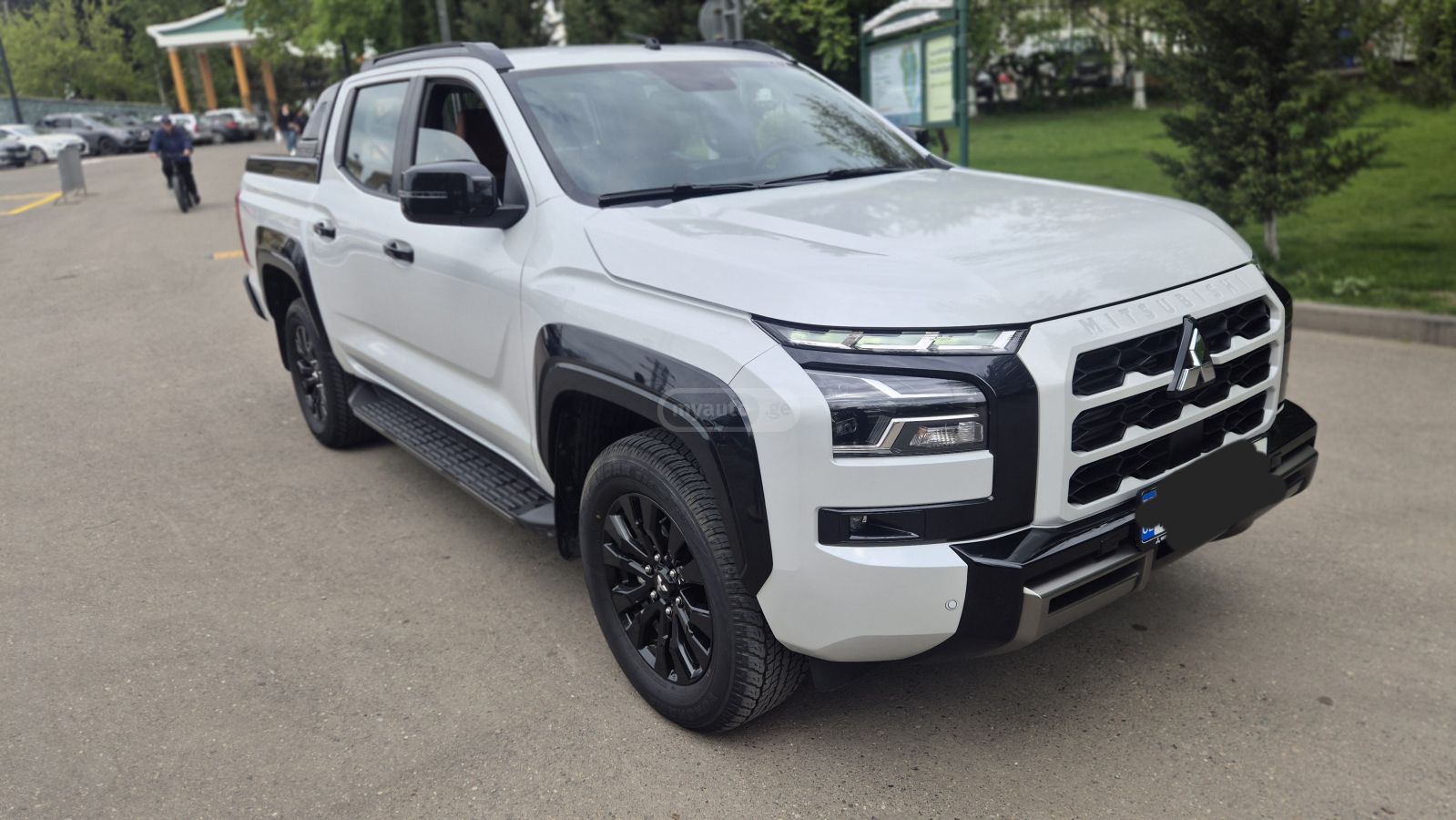 Mitsubishi L200 - фото 1